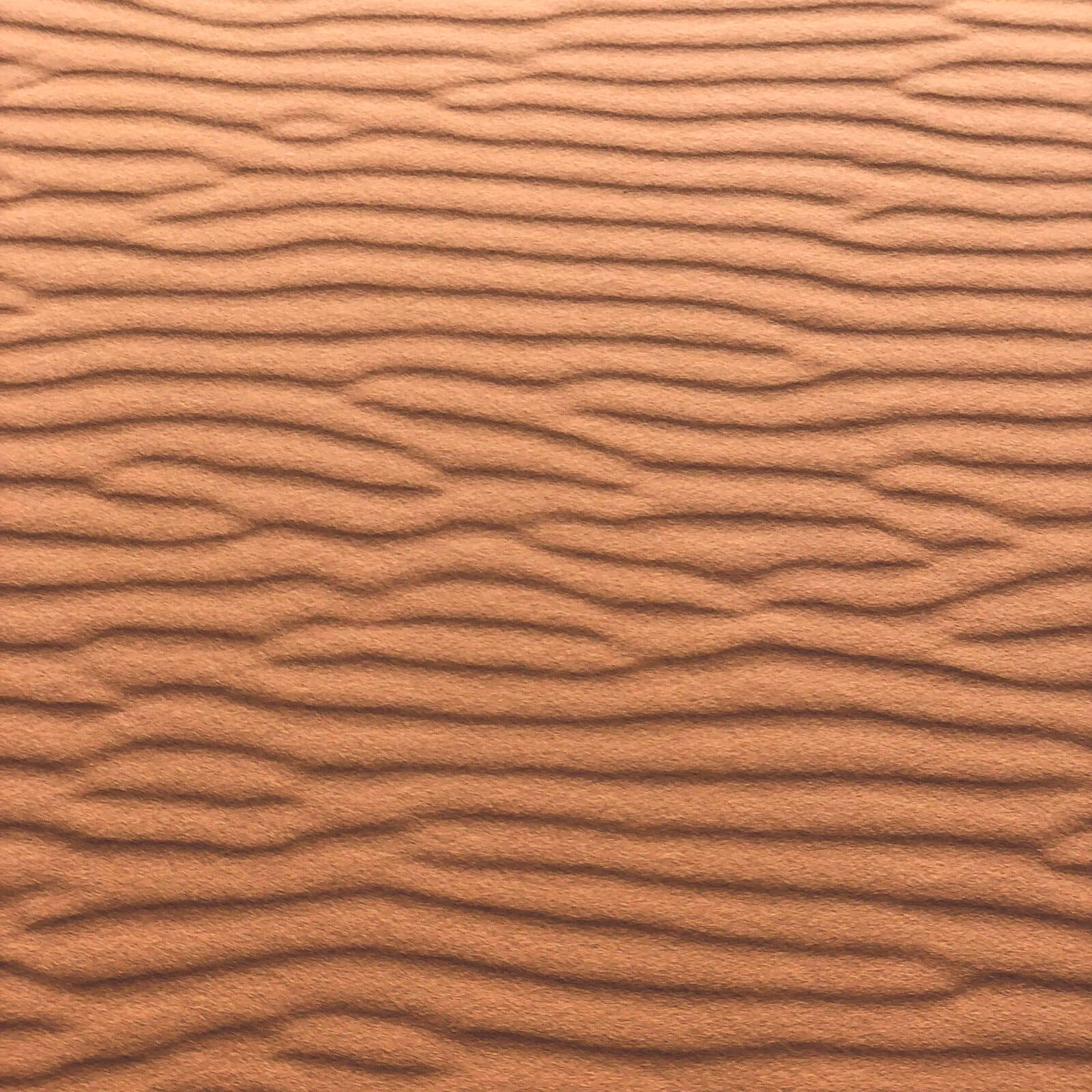 Textura de tierra y barro en tonos cálidos vista de cerca