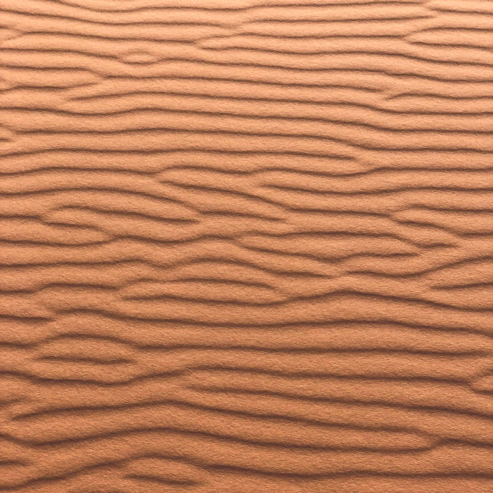 Textura de tierra y barro en tonos cálidos vista de cerca